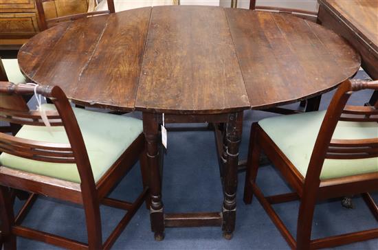 An early 18th century oak oval topped gateleg dining table, 4ft 4in. x 3ft 3in. H. 2ft 3in.